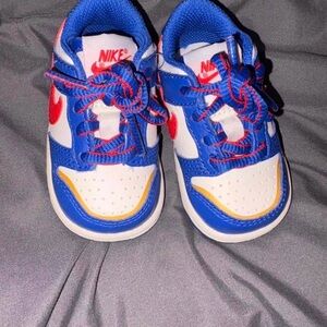 Nike Kids Sneakers in Blue, White, and Red